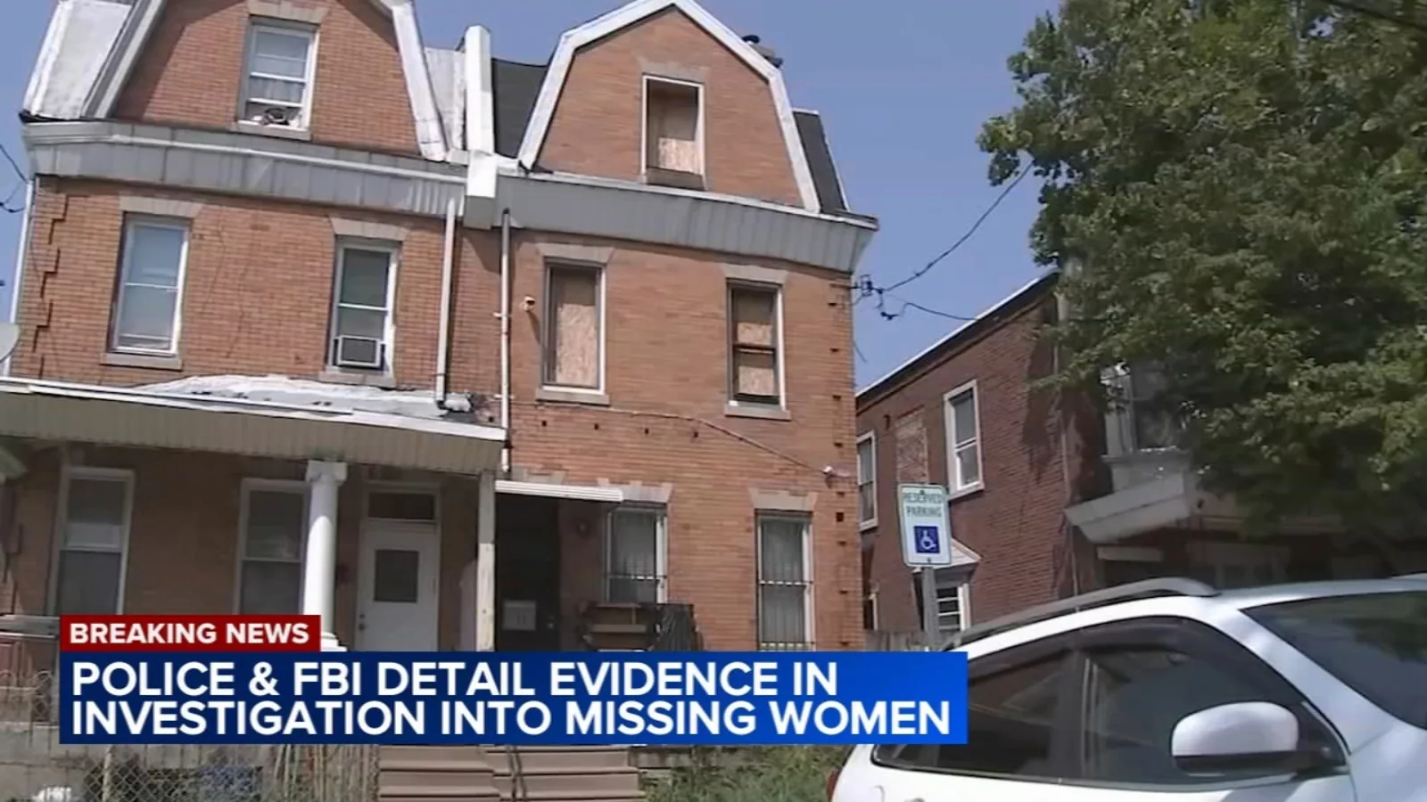 Police investigators outside a Philadelphia home linked to a months-long missing persons case