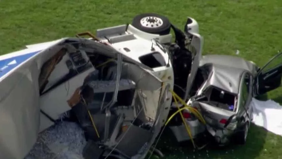 Overturned box truck and debris at a crash scene on Route 8 in Butler County