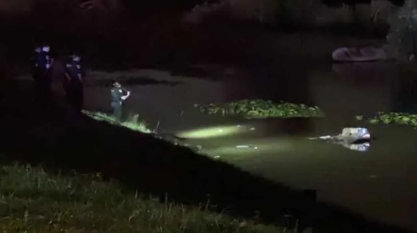A Toyota Corolla is pulled from a lake after a Seminole County crash near Maitland Avenue